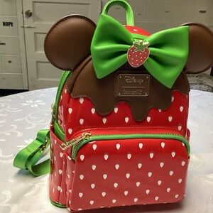 LOUNGEFLY BACK PACK STRAWBERRIES SO SO RARE. DISNEY PARKS💚♥️💚♥️💚♥️